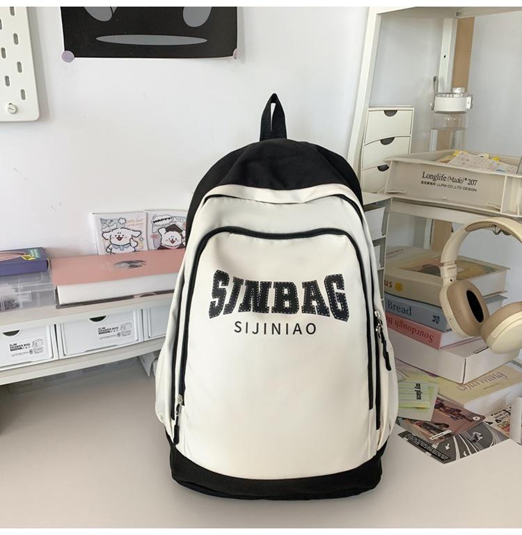 

New junior high school schoolbag female original niche high school student casual backpack male trend чорний
