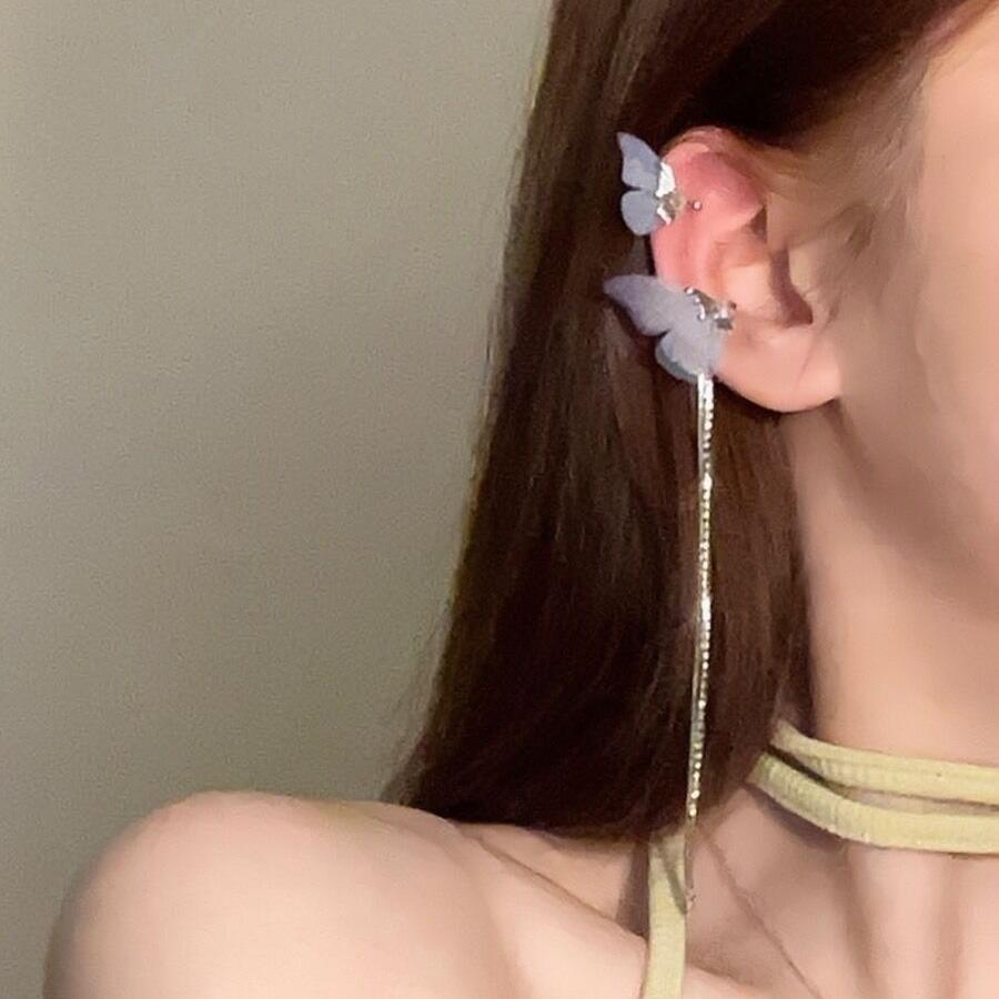 Super fairy diamond-set purple butterfly long fringed ear clips, niche design, no ear piercings, ear bone clips, personalized temperament earrings.