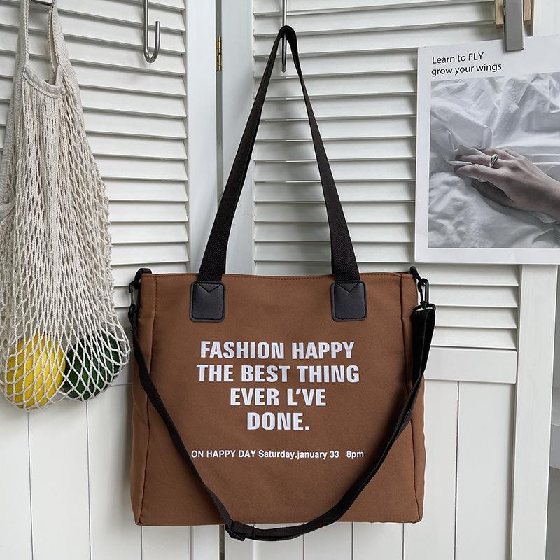 Simple canvas large-capacity bag women's summer new shoulder fashion letter tote bag messenger bag bag