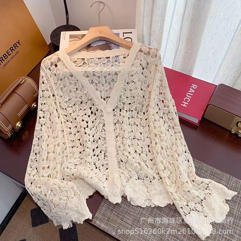 Fashion loose and thin hollow crochet knitted sweater women's new foreign style unique chic cardigan long-sleeved top