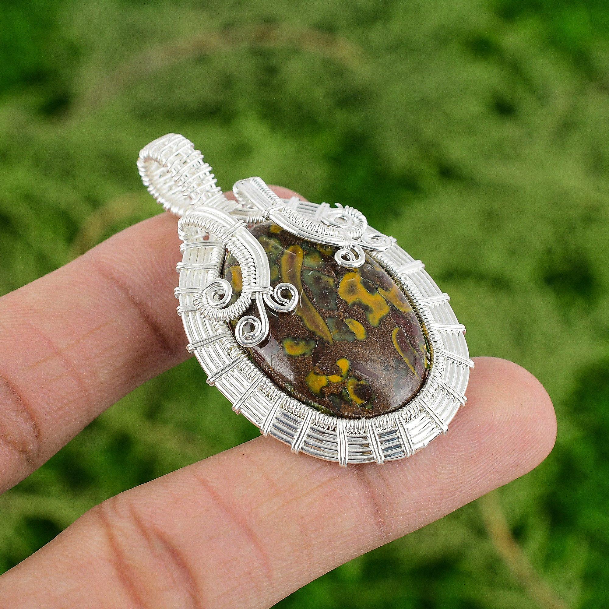 

Oval Natural Rhyolite Wire Wrapping Mother Pendant Jewelry 925 Sterling Silver
