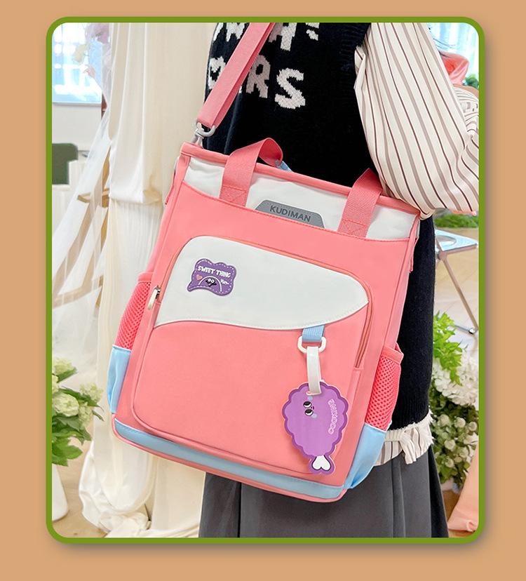 Cool Dyman Student Backpack - Versatile, Large-Capacity, Hand-Carry, Double/Single Shoulder, Crossbody Bag for Campus & Tutoring.