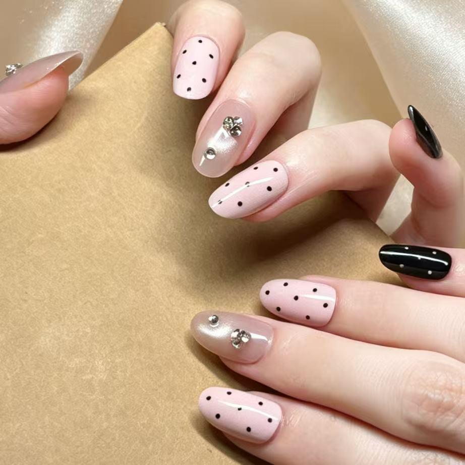 Pink Black Crystal Xi 2026 Nude Translucent Cat Eye Press-On Nails with Polka Dot, Four-Leaf Clover, and Rhinestone Decoration