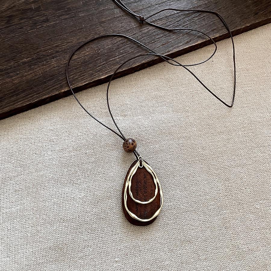 Retro Ethnic Leather Rope Necklace with Wooden Heart, Leaf, and Geometric Water Drop - High-Grade Sweater Chain