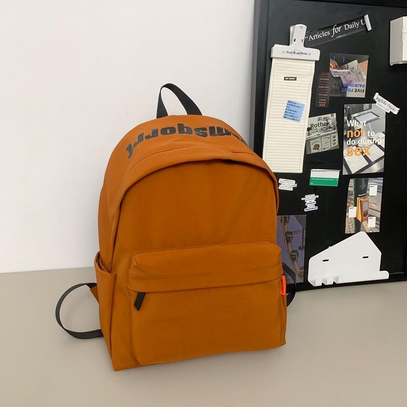 Backpack male college student fashion large-capacity schoolbag female high school student travel lightweight large-capacity computer backpack tide