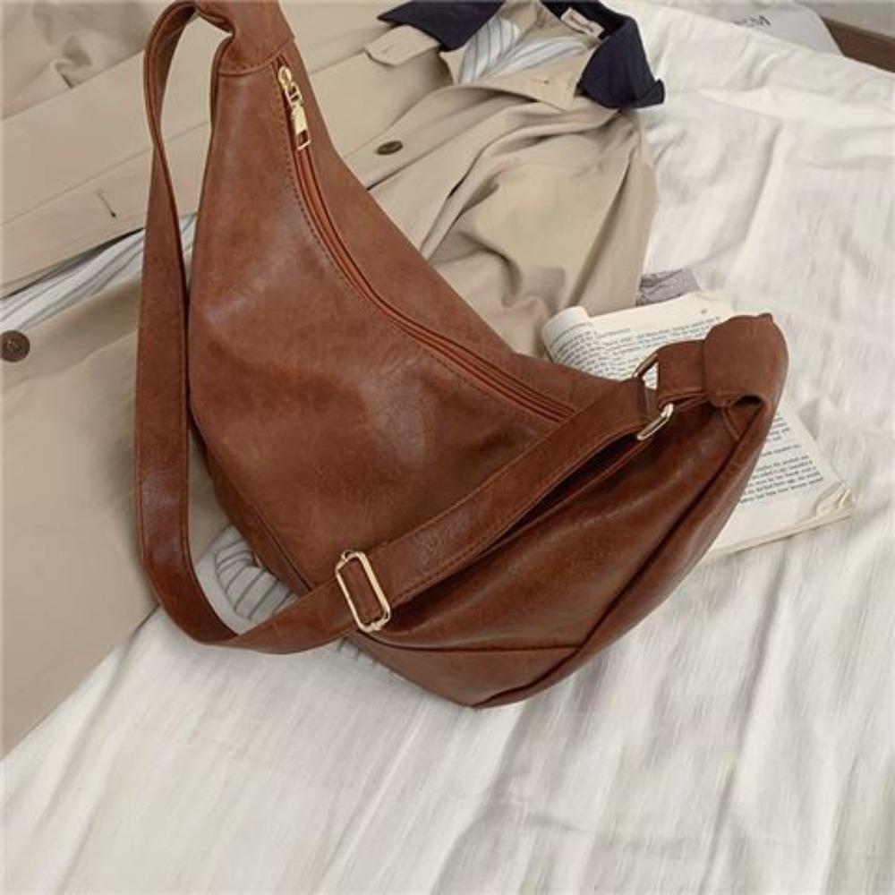 Casual large-capacity bag Autumn and winter female tide retro dumpling bag Korean versatile messenger saddle bag