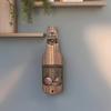 A Wall-Mounted Bottle Opener And Beer Cap Collector Box Suitable for Various Settings Like Home Bars