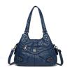 Shoulder leather locomotive bag New large-capacity women's bag Atmospheric commuter bag Woven leather button pleated bag