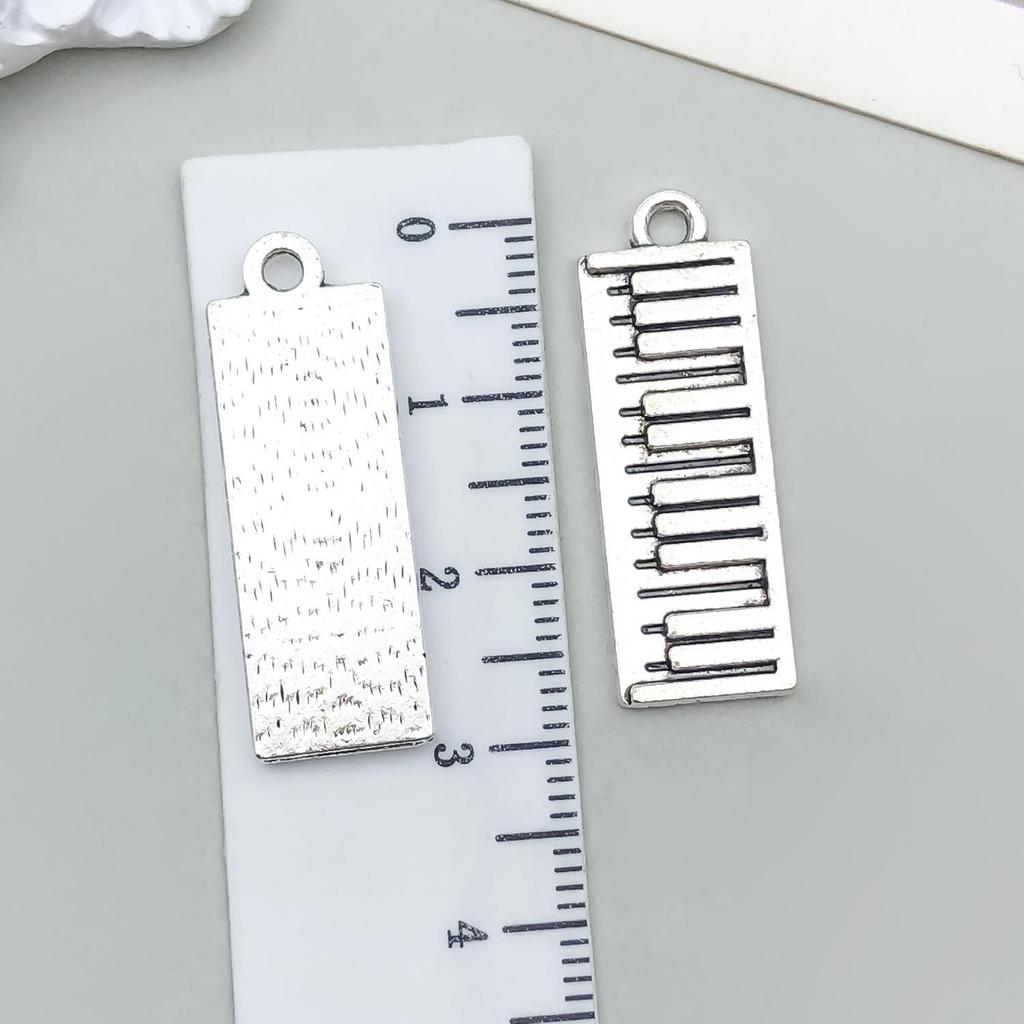 Starožitný stříbrný slitinový přívěsek ve tvaru noty na kytaru pro DIY šperky