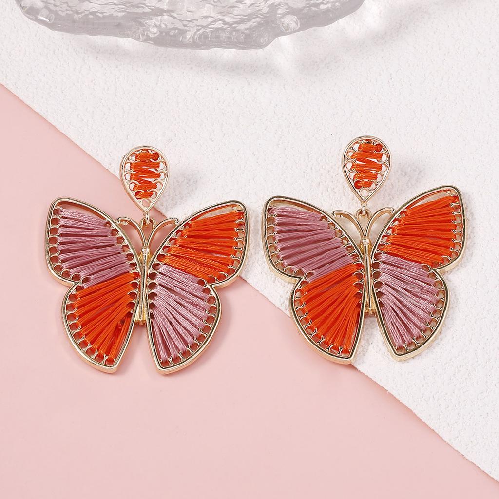 New handmade wound woven butterfly earrings alloy frame dancing fresh and sweet wind earrings