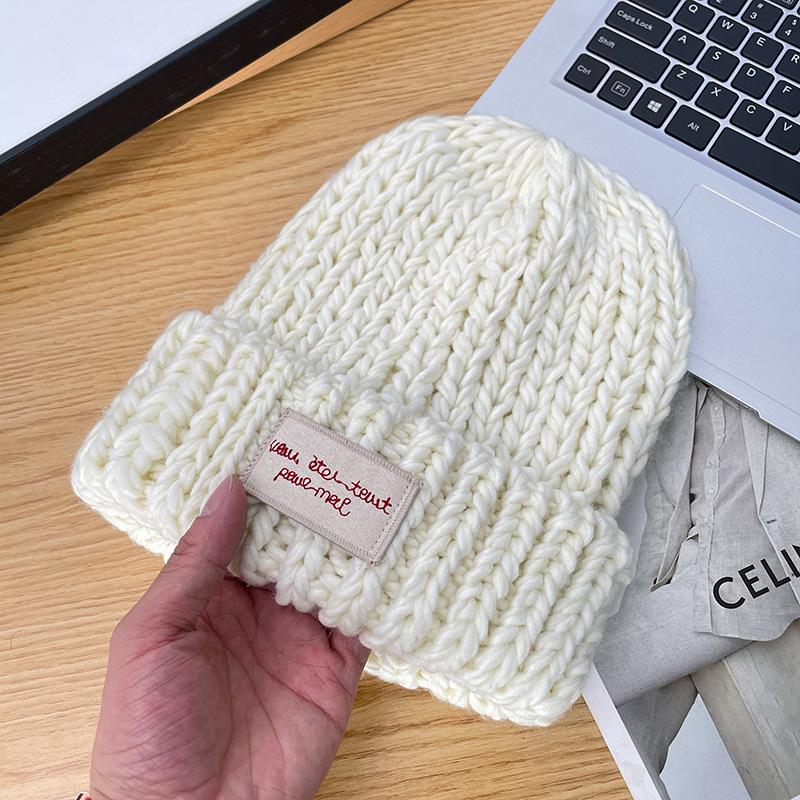 

Осінньо-зимова латкова вовняна шапка для тепла та захисту від холоду в японському студентському стилі, в язана шапка для захисту вух, холодна шапка для жінок