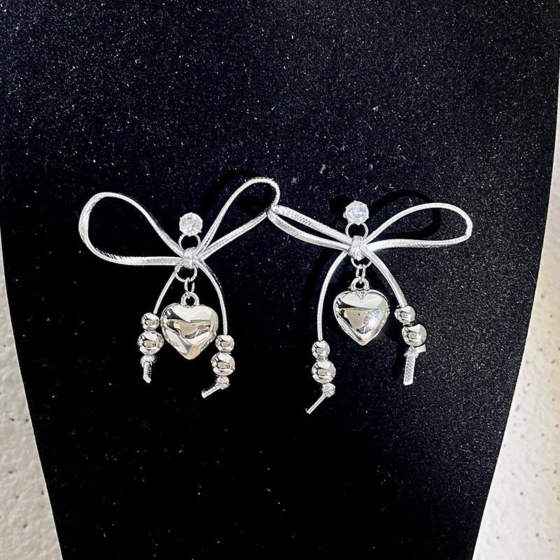 Love pendant collarbone chain pearl bead leather bow tassel necklace niche high-end necklace