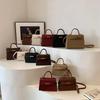 Neue High-End-Litschi-Muster-Größe Kaibaoli Tragbare Schulter-Schrägband-Damenhandtasche KTB