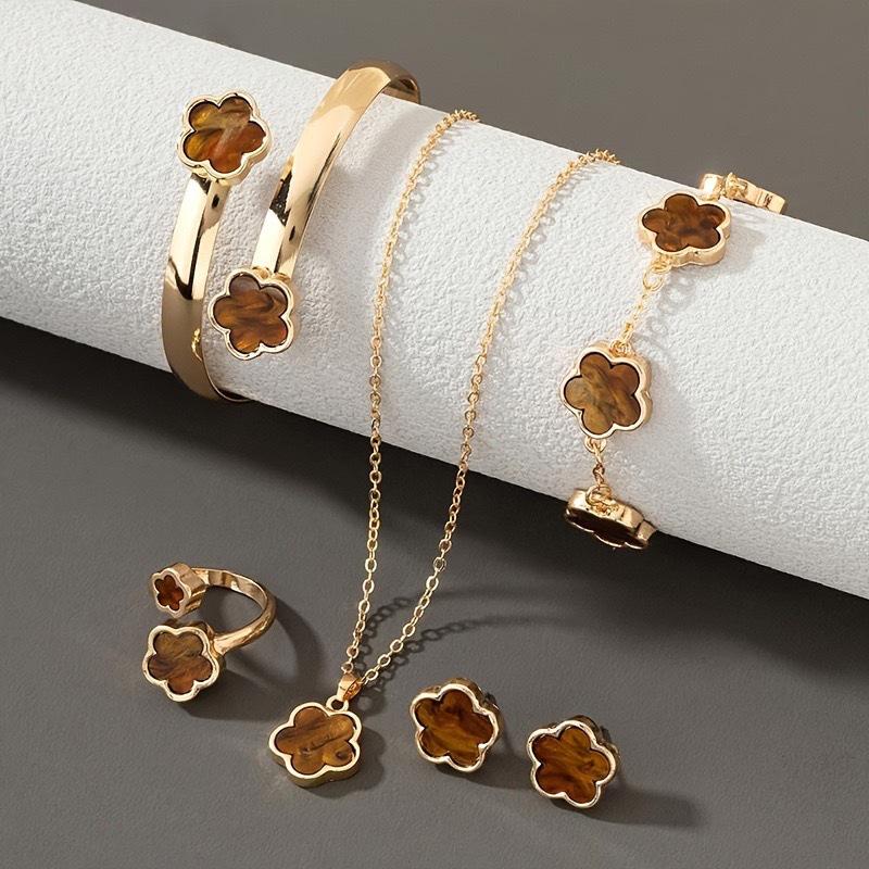 Elegant 5-Piece Flower Jewelry Set: Necklace, Bracelet, Earrings, and Ring.