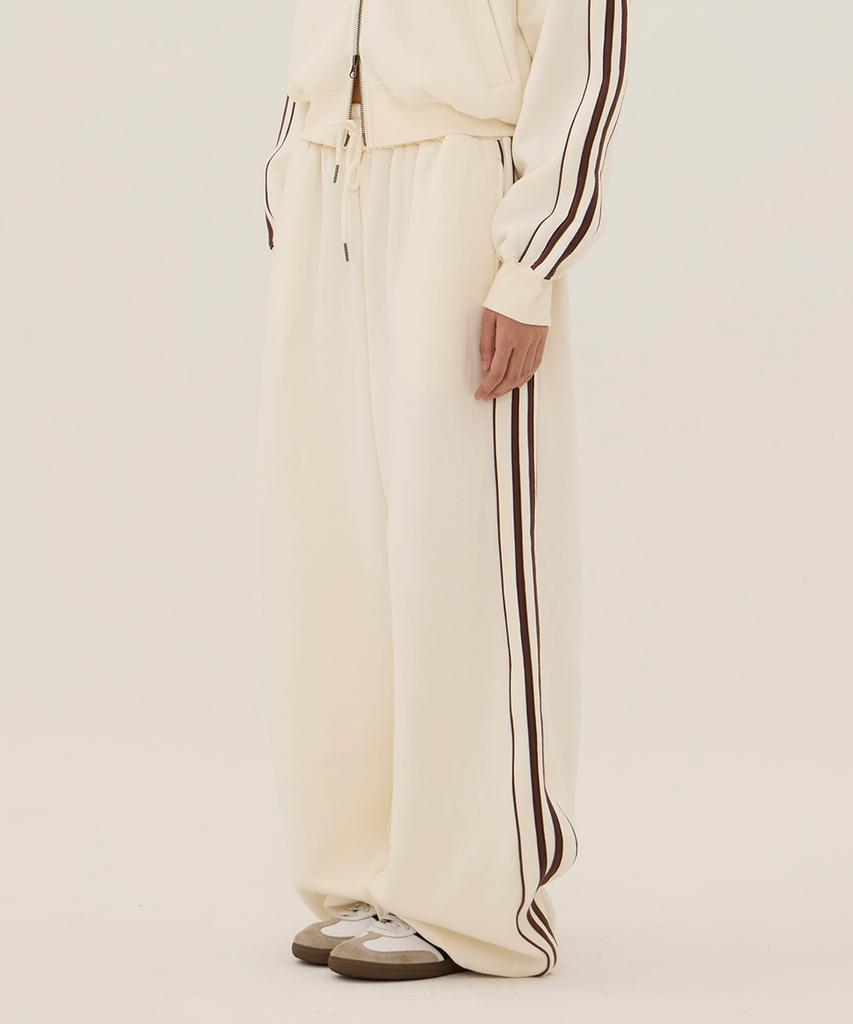 DANGLEDROP Dgdp Lettering Low-Rise Wide Track Pants_Ivory