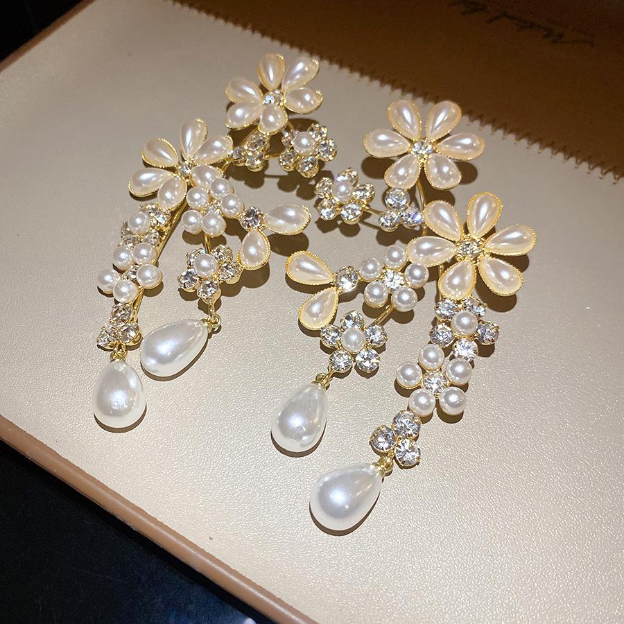 

European and American retro silver needle diamond pearl flower earrings personalized fashion exquisite earrings light luxury high-end earrings women