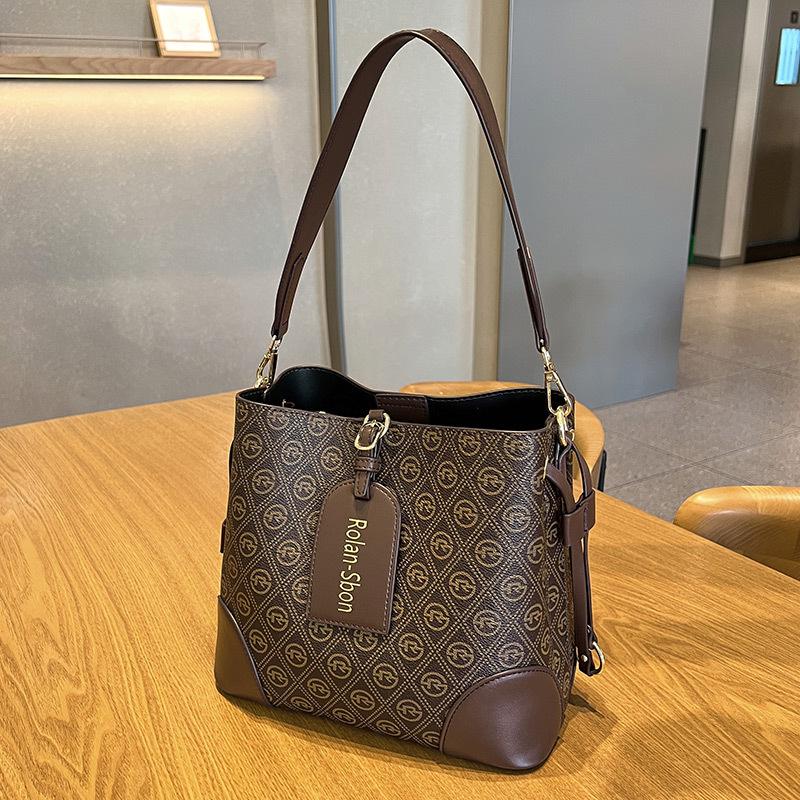 Vielseitige Nischen-Bucket-Bag Neue Einfache Schräge Satteltasche für Damen Große Kapazität Bedruckte Einzel-Schulter-Handtasche für Damen