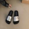 Silver flat-soled one-word drag shoes women's shoes wear new summer soft-soled beach sandals