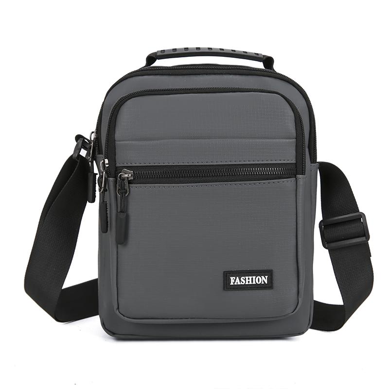 

Ділова чоловіча сумка-месенджер - Простора сумка-слінг через плече з численними кишенями-органайзерами сірий колір