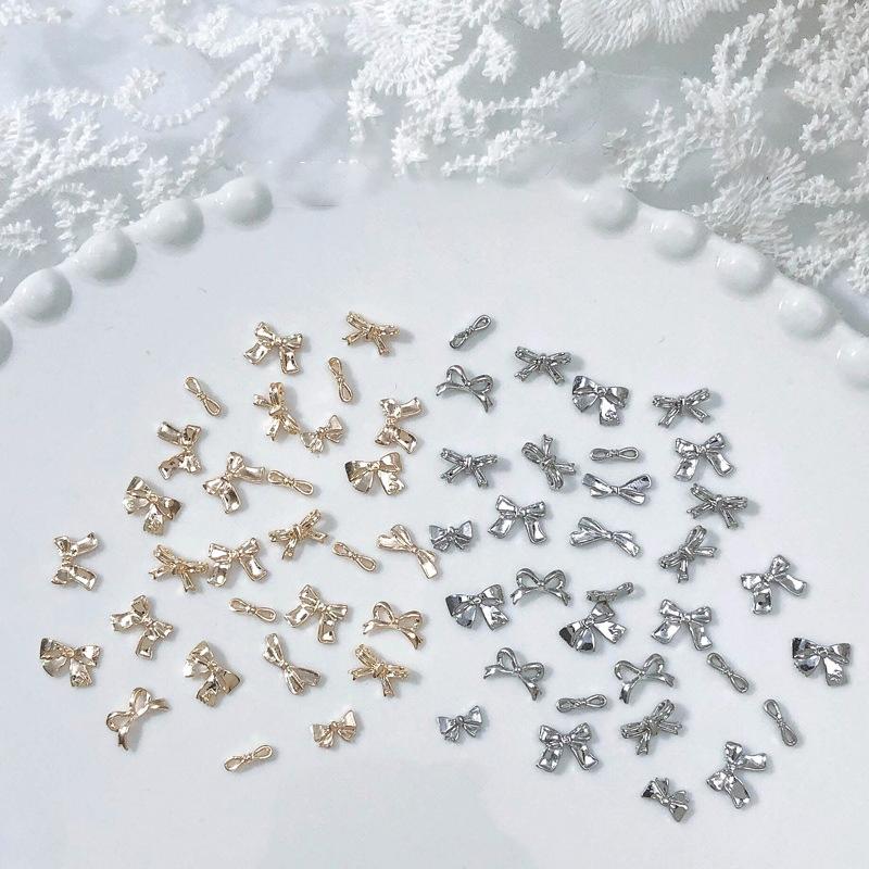 50/100Pcs Silver Metal Bows Nail Art Charm 3D Alloy Silver/Gold Bowknot Ribbon Nail Decor Parts Diy Luxury Manicure Accessories