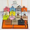 Chic Mini Bag Charm - Cute Earphone Pouch & Coin Purse with Car Keychain Decoration.