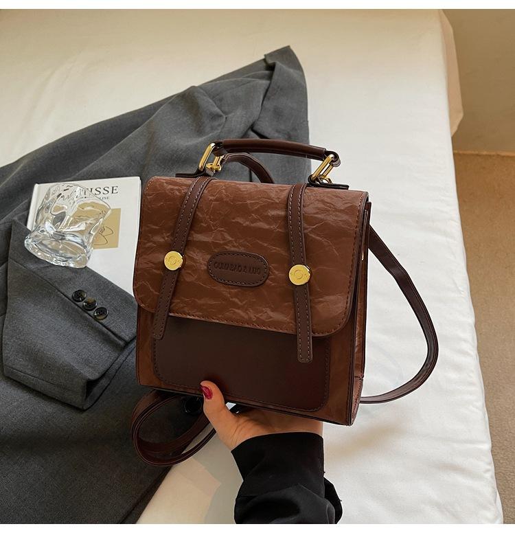 

College style retro versatile small bag women 2025 new fashion backpack niche design commuter messenger bag