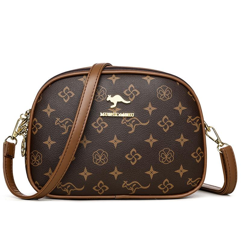 

Сумка женская новая сумка 2025 года, сумка-мессенджер, модная женская сумка с принтом, маленькая круглая женская сумка через плечо, сумка-ракушка коричневый