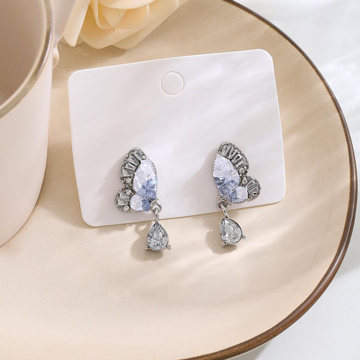

Exquisite Diamond Butterfly & Teardrop Earrings: Silver Needle Luxury Summer Collection