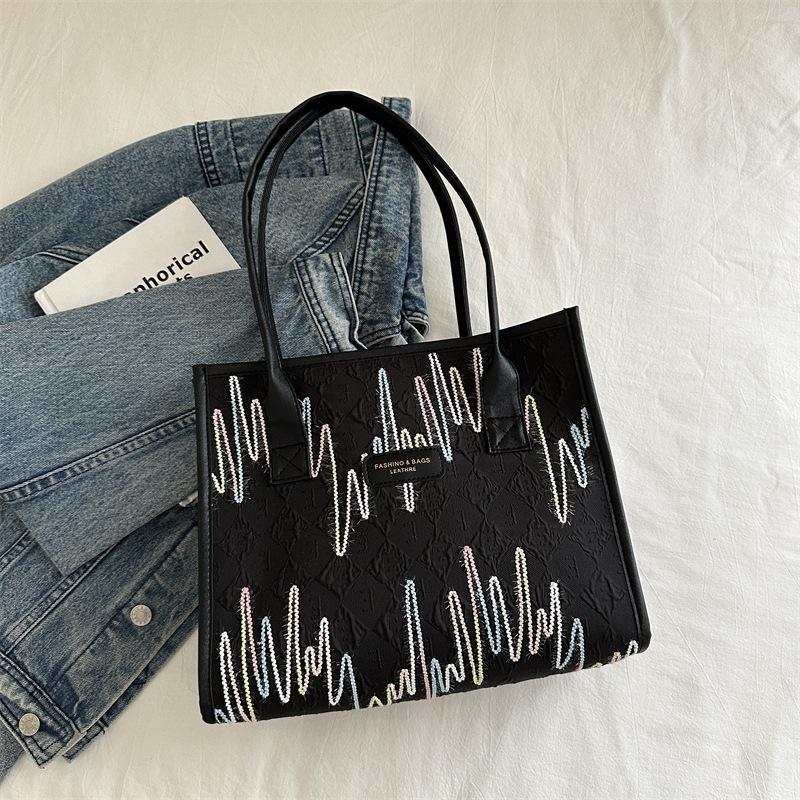 Stylish portable shoulder bag, commuting beautiful large-capacity canvas bag, simple 2025 new women's bag, foreign style tote bag