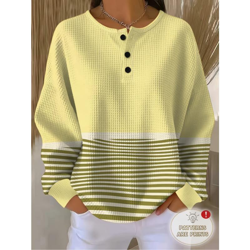Women's Three-Button Henley Collar Waffle Long-Sleeve Top, Featuring a Contrasting Stripe Patchwork Design.