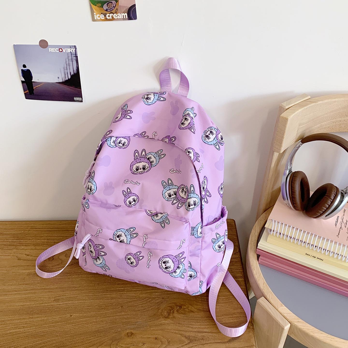 

New printed casual large capacity lightweight student backpack for men and women, the same style bag labubu simple and versatile CLE фіолетовий