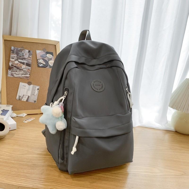 Simple Solid Color Student Lightweight Backpack With Plush Pendant For School