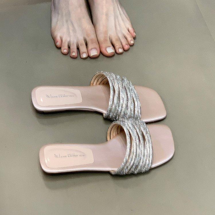 Fashion one-word slippers women's 2025 summer new outer wear lazy rhinestones with low heels open-toed sandals high sense