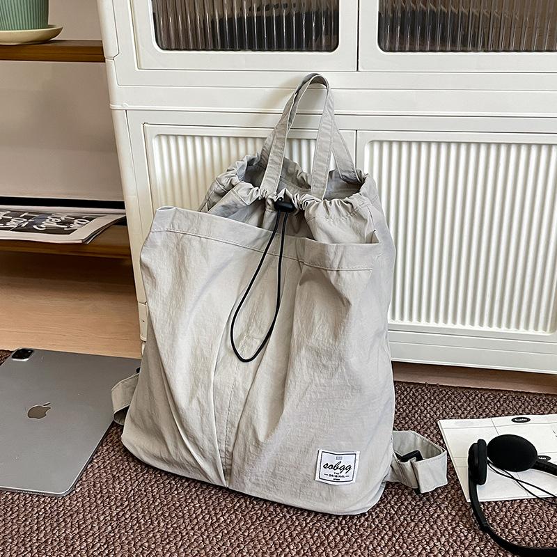 

School bag male college students Japanese niche design large capacity foreign style backpack lightweight female high school students travel backpack