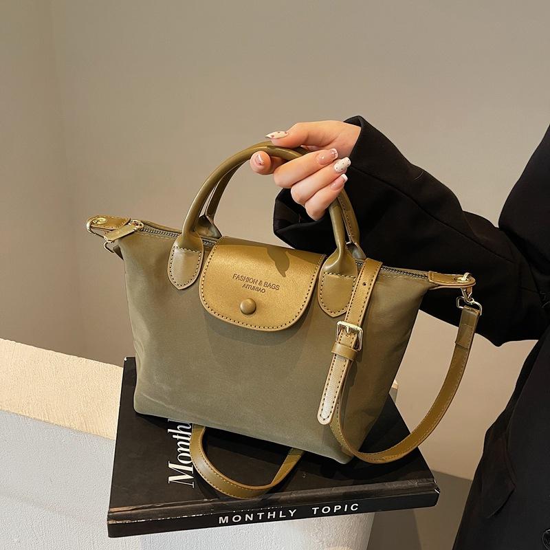 Light luxury casual high-end bag women's 2025 new lightweight nylon cloth dumpling bag commuter messenger bag