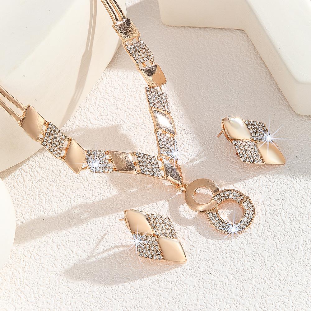 Zinc Alloy Inlaid White Rhinestone Metal 8-shaped Necklace Earring Set
