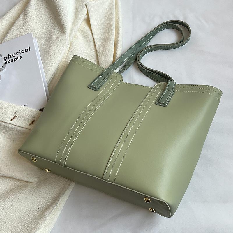 Skulderveske med stor kapasitet og ny stilig tekstur, allsidig pendler-veske for vår og sommer