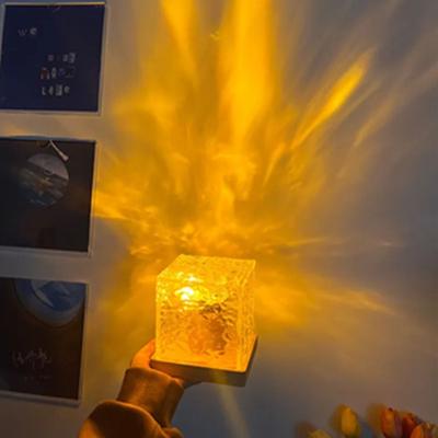 Comodino della camera da letto con luci notturne in acrilico con increspatura dell'acqua rotante a 16 colori