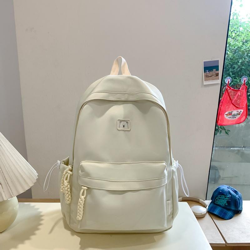 New Niche Primary School Students Boys and Girls Universal Large-capacity Lightweight Simple Korean Version Solid Color Large-capacity Schoolbag