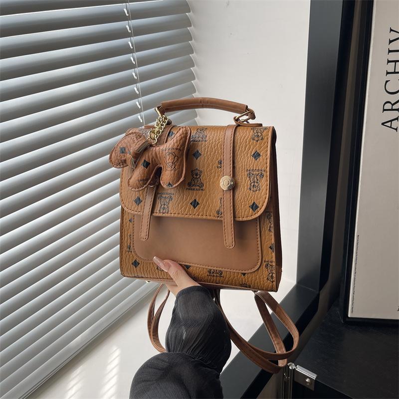 

Новый нишевый простой трендовый студенческий класс маленький рюкзак женская сумка ретро мода с принтом рюкзак Without pendant коричневый