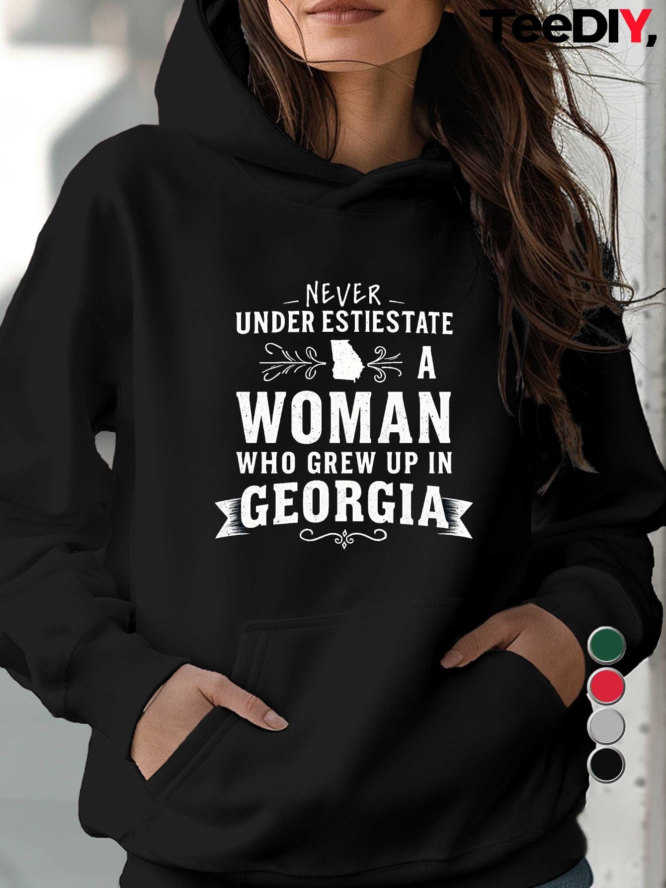 

Never Underestimate Woman Georgia women s hoodies XXL чёрный