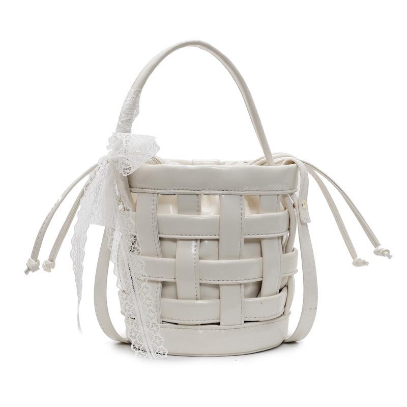 

Korean version of niche hand-carried bucket bag women s 2025 spring trendy versatile fashion woven bag foreign-style oblique shoulder bag белый