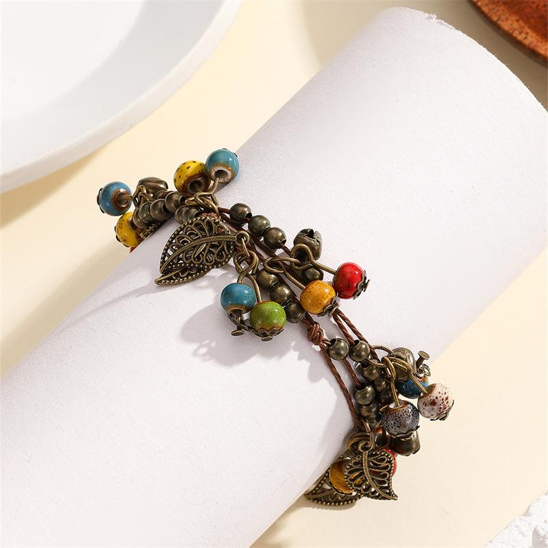 Retro Bohemian Literary Small and Fresh Cherry Bead String Fringed Bracelet, Rare and High-end Fashionable Ethnic Accessory.