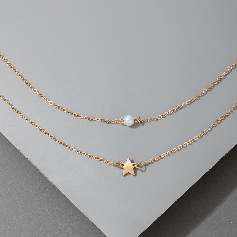 Korean version of fashion pearl five-pointed star necklace femininity Japanese and Korean star collarbone chain design sense new necklace