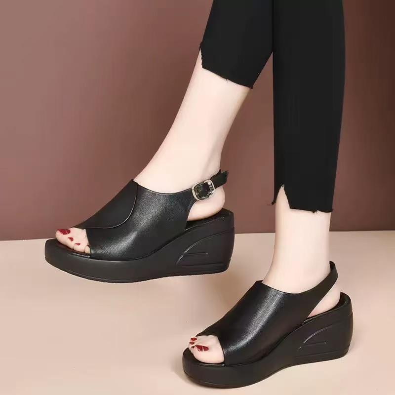 2025 summer new real soft leather slope heel cool slippers women wear fashion Internet celebrity muffin thick bottom one word cool slippers