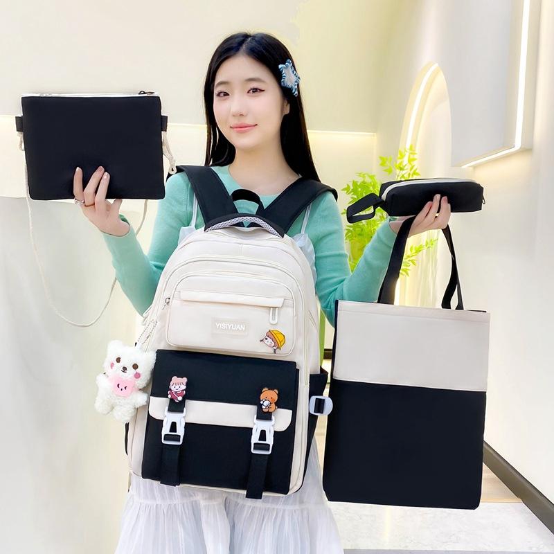 Small, fresh and large-capacity junior high school schoolbag women's casual and durable backpack three-piece schoolbag