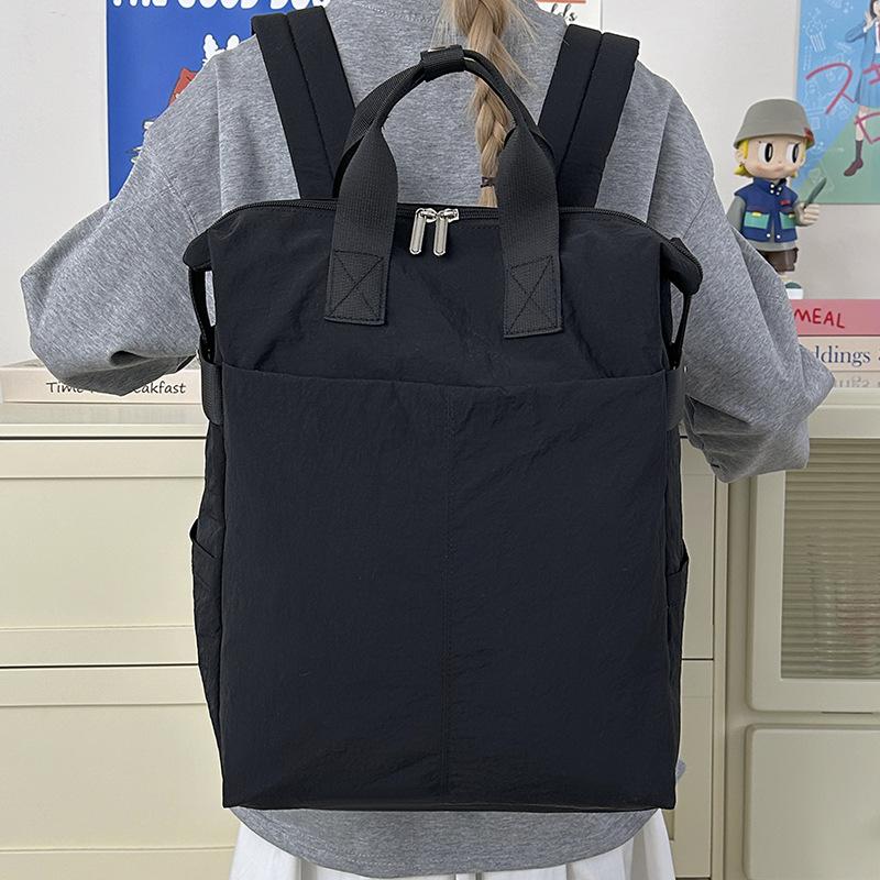 Schoolbag Backpack Women's Waterproof Splash Large Capacity High Value Outdoor Travel Breathable Lightweight Backpack Men's Baigou Bag