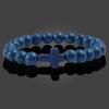 Turquoise Cross Elastic Yoga Bracelet with Black Volcanic Stone