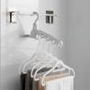 Four clip-on portable hangers and one folding hanger for easy storage. Ideal for travel, business trips, and indoor laundry drying. (4 colors availabl