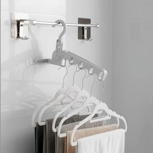 Four clip-on portable hangers and one folding hanger for easy storage. Ideal for travel, business trips, and indoor laundry drying. (4 colors availabl